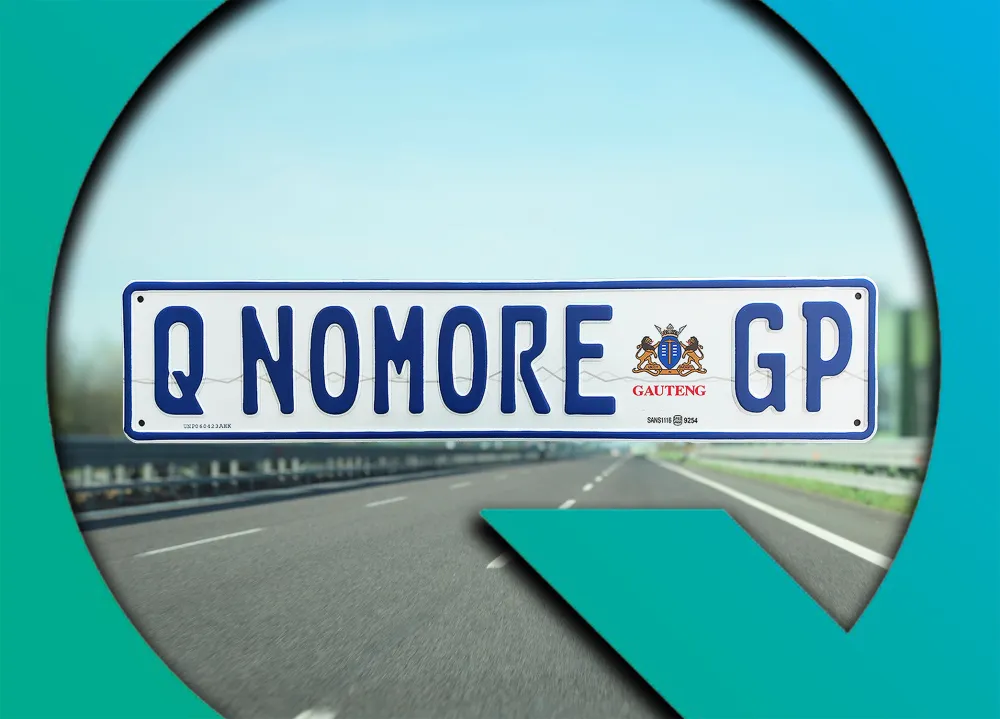 A Q No More number plate on a vehicle on the highway